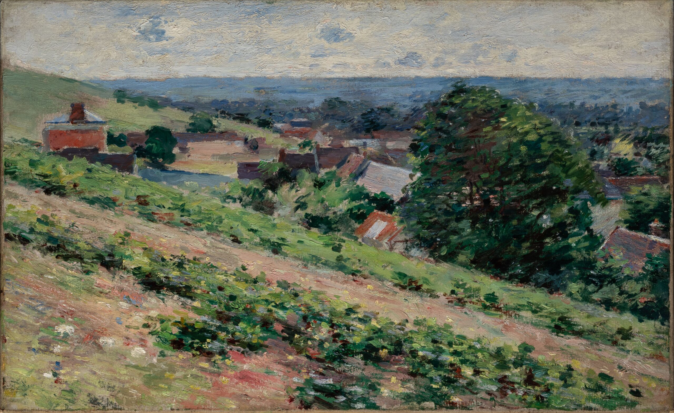 An impressionist painting of a hillside. The foreground depicts a green and brown hillside, and a small village and trees is in the background.
