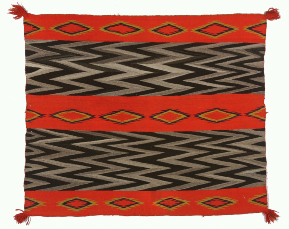 A red and black woven blanket.