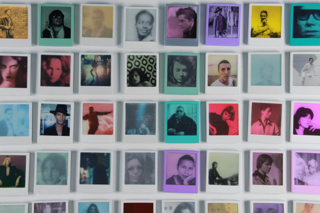 Polaroid photographs arranged in a grid.