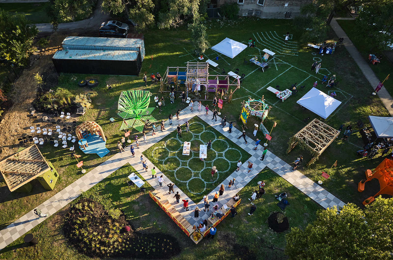 Overhead view of a festival in a park.