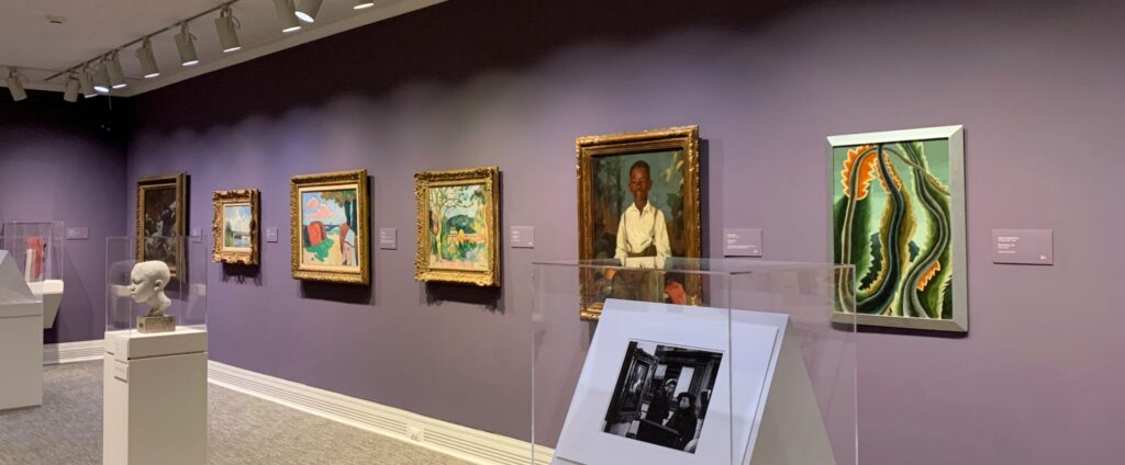 Image of artworks on a wall.