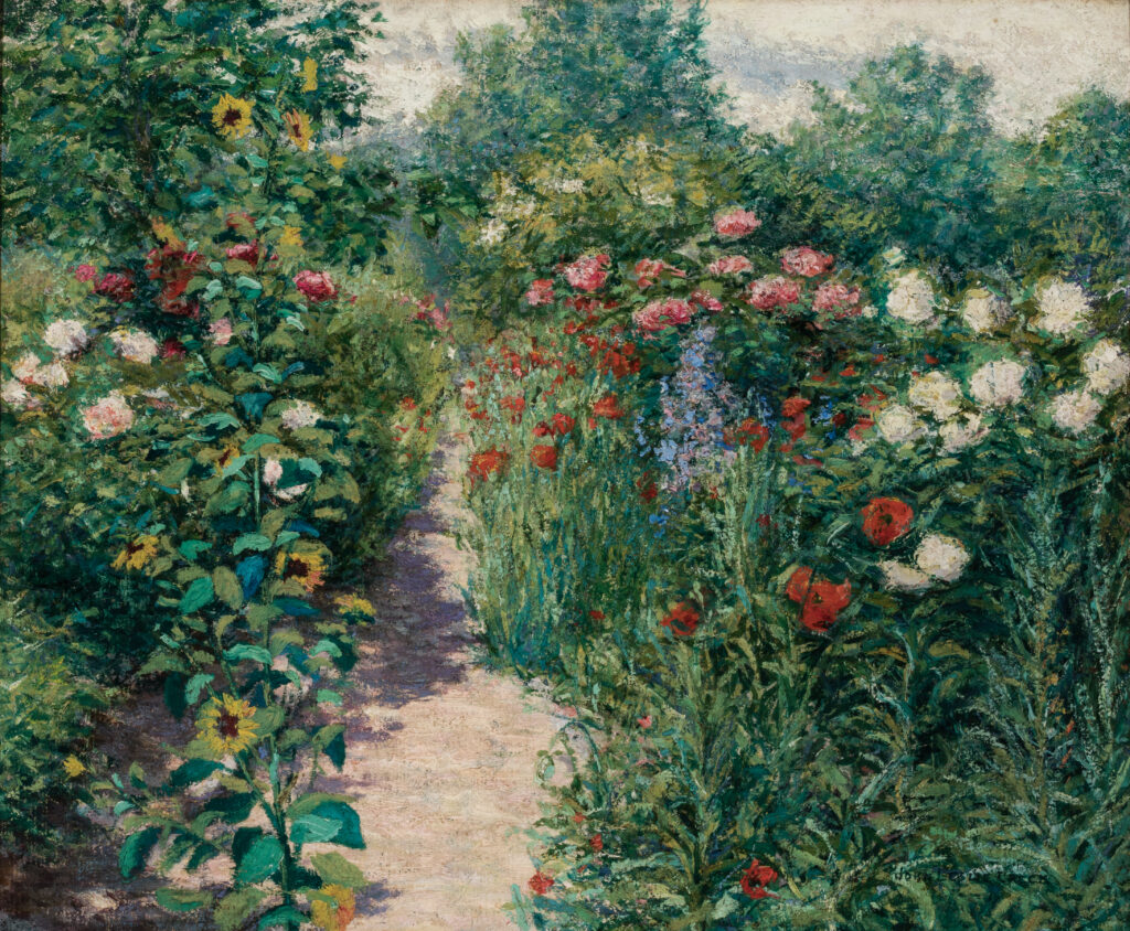 A colorful garden with many types of bright flowers.