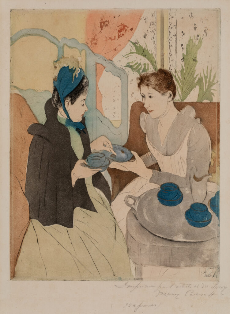 Two women drinking tea.