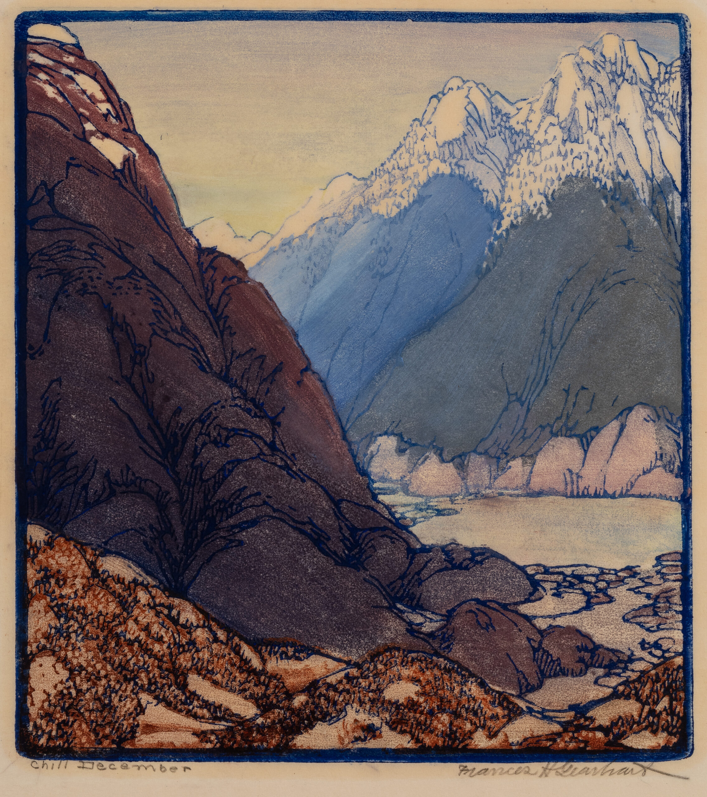 Two tall mountain peaks surround a lake. There is snow on the tops of the mountains.