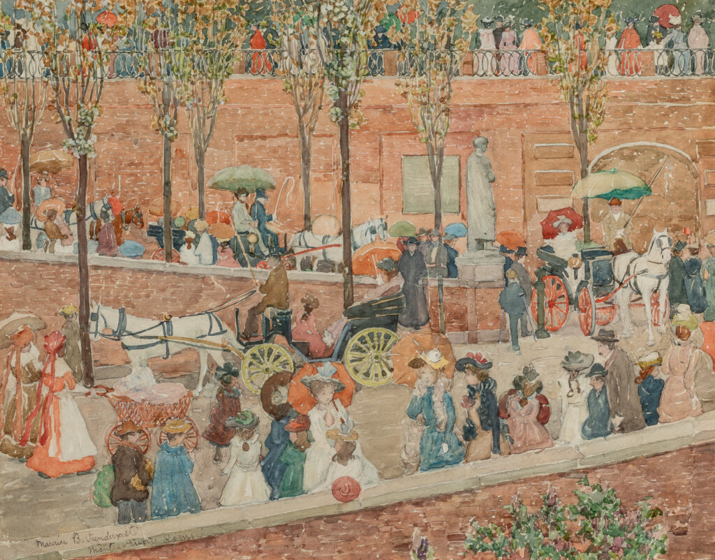A crowd of people walking in a park.