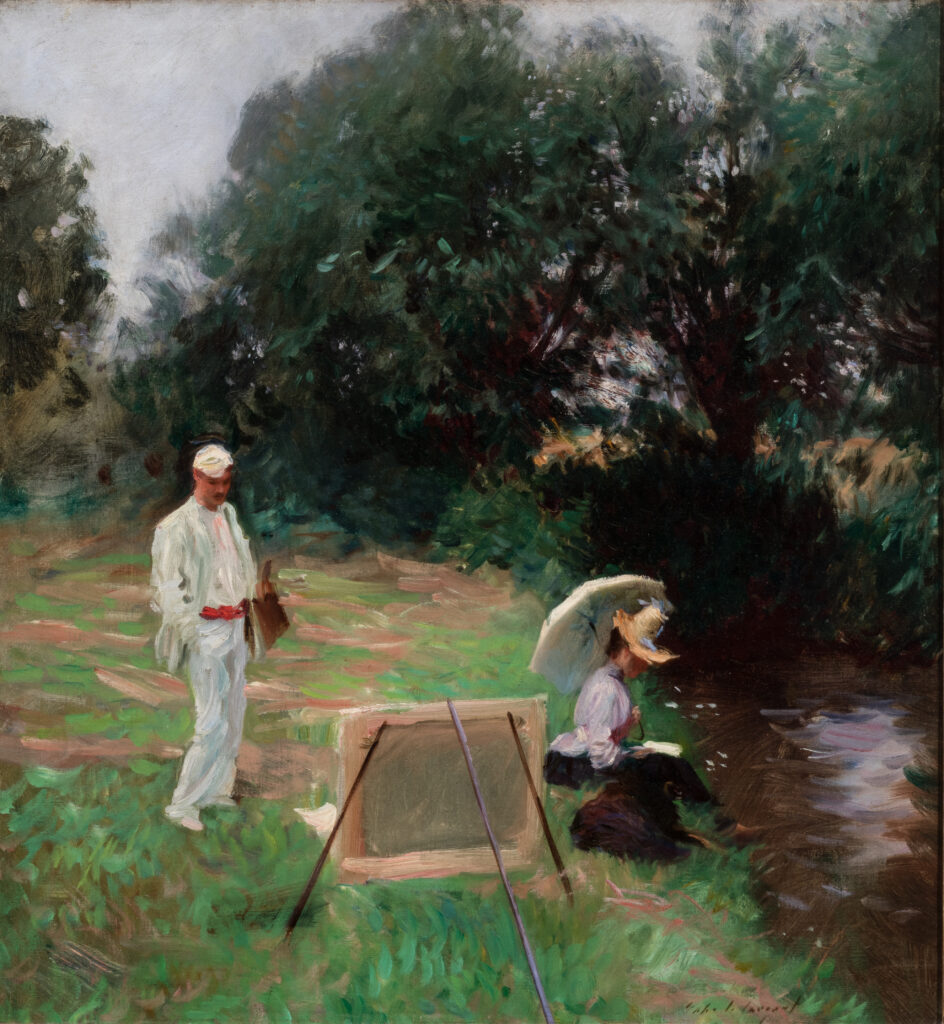 A man painting on an easel and a woman reading a book by a river.