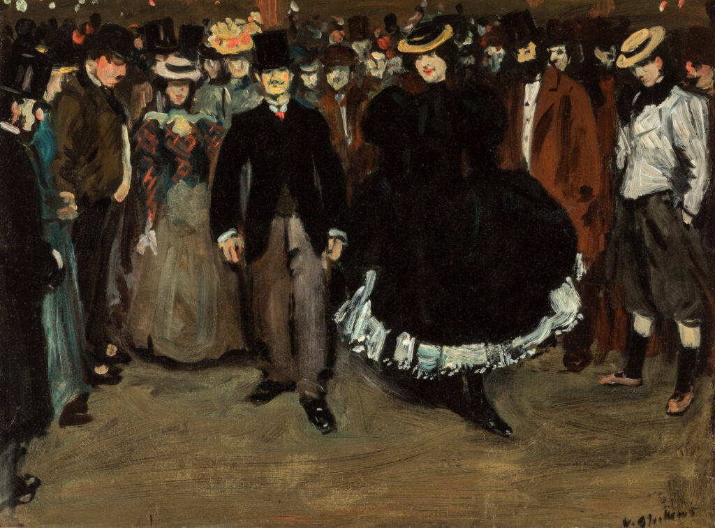 A group of people dance in a circle.