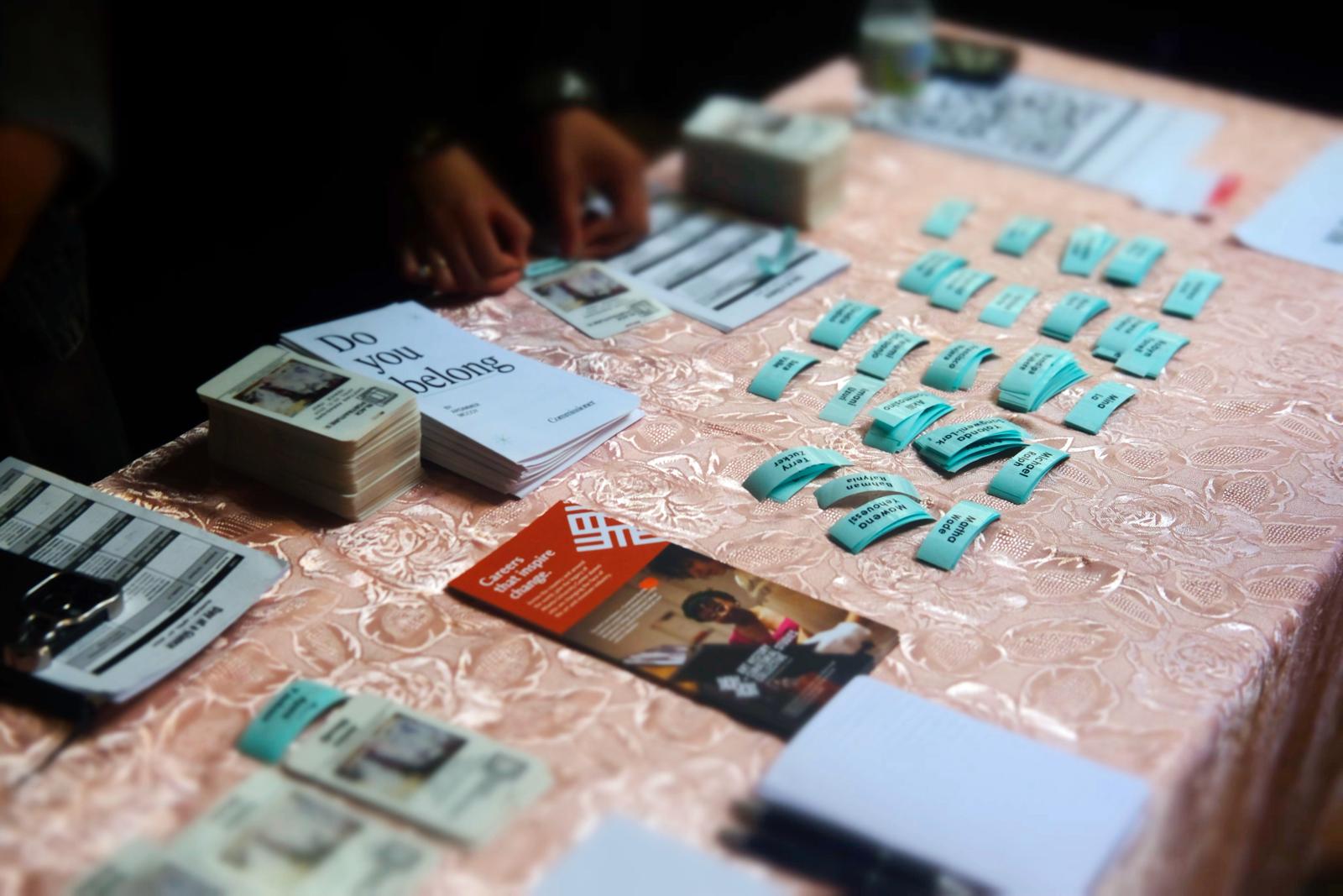 Table with brochures and tickets.