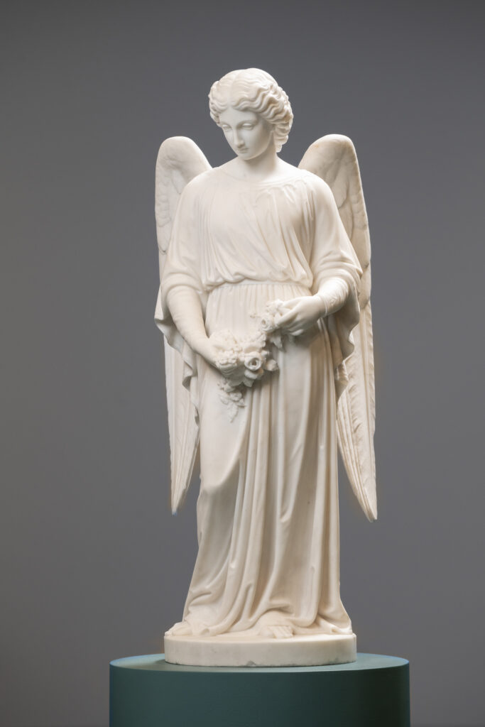 Statue-like image of an angel-like figure.