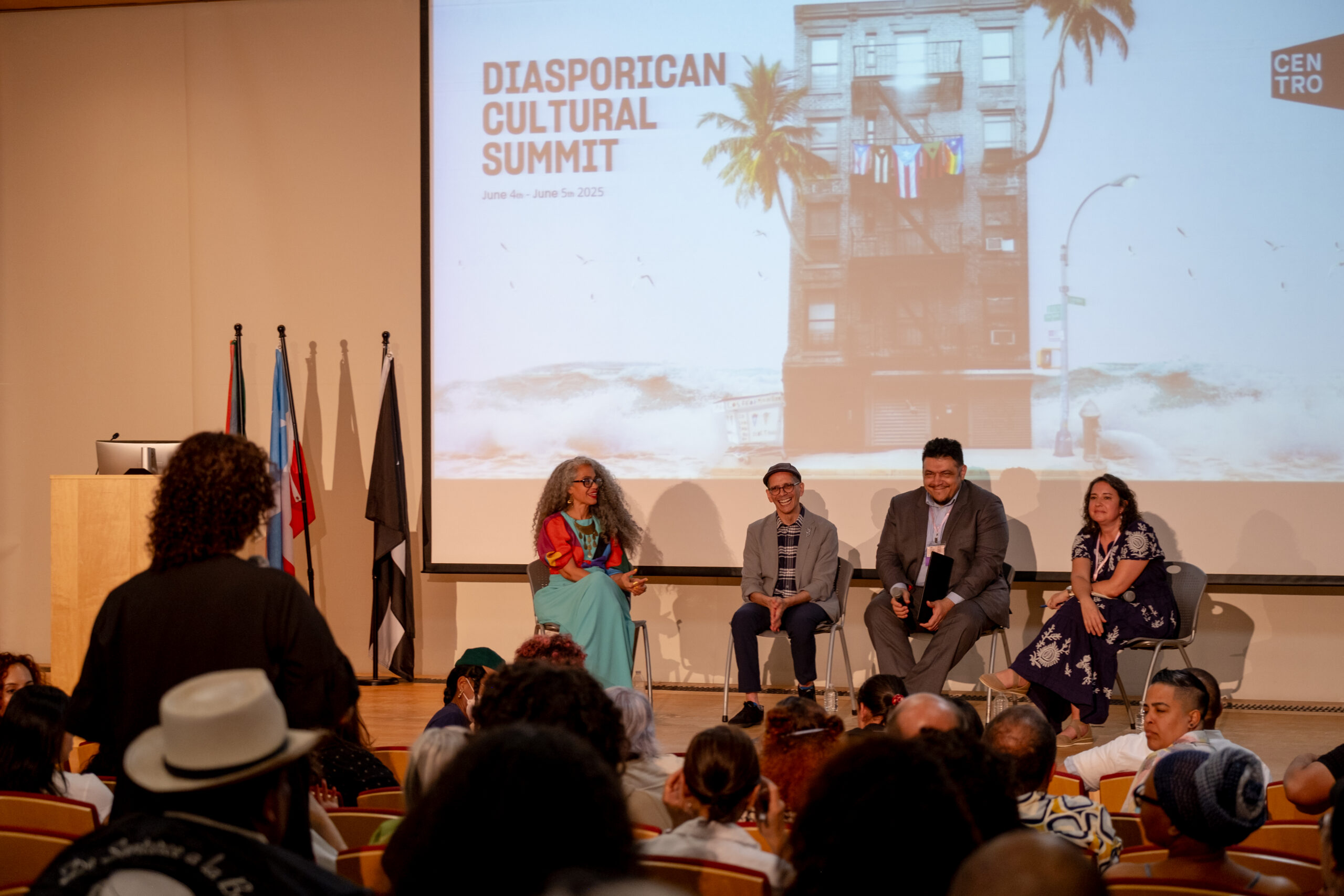 A group of people at a panel.